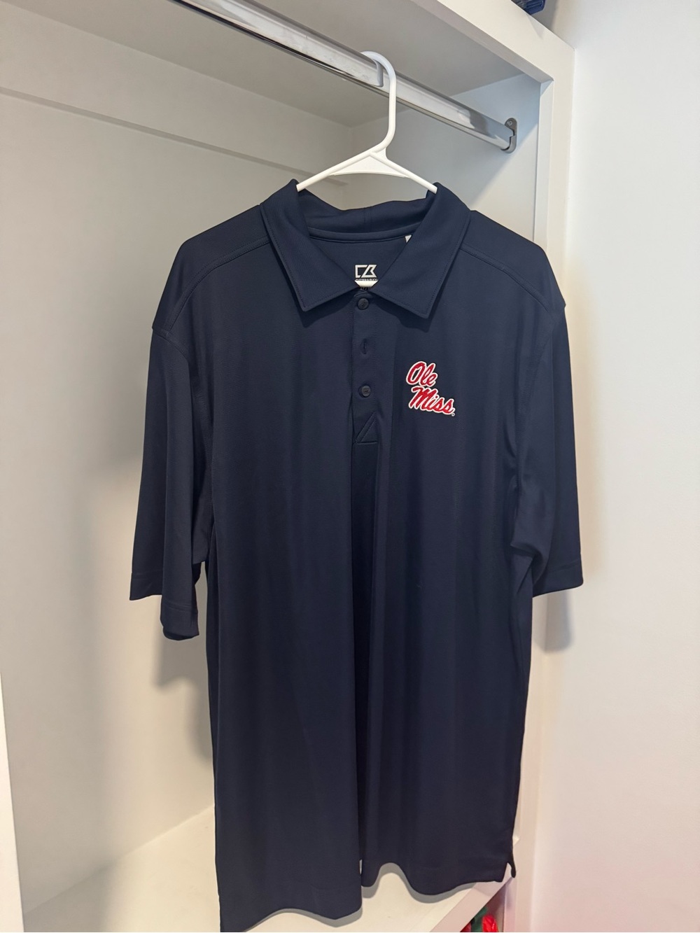 Cutter & Buck Navy Polo with Red Ole Miss Logo